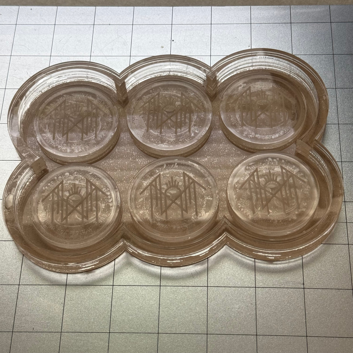Used Token Acrylic Blank for Mold Making with Attached Housing