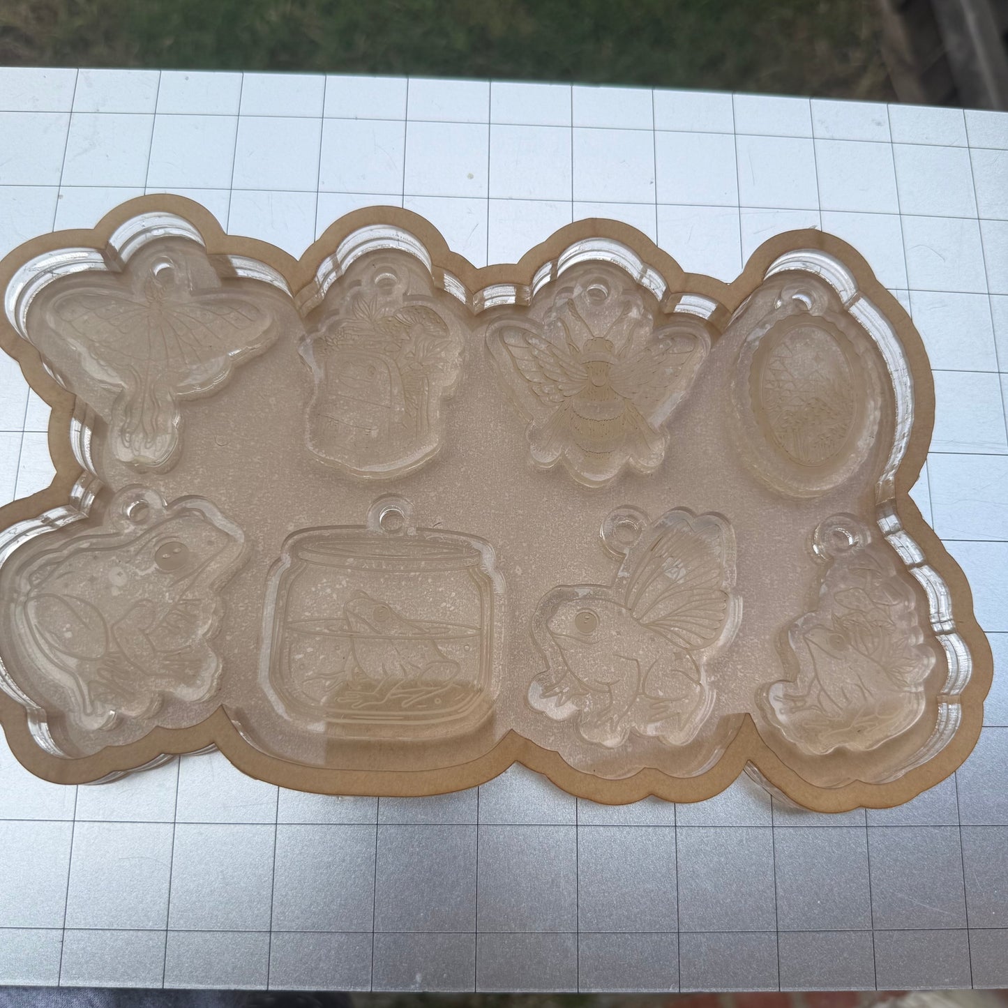 Used Goblincore Keychain Acrylic Blank for Mold Making with Attached Housing